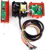An industrial remote control transmitter and receiver disassembled, showing the internal components and wiring. Náhled obrázku produktu
