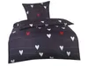 A bedding set with a heart pattern on a white background.
