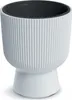 A white planter with a black inner pot, shown against a white background. Produktbild-Vorschau