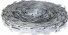 A roll of razor wire on a white background. Voir les images du produit