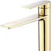A close-up of a modern gold and silver faucet. Náhled obrázku produktu