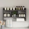 A wall-mounted shelf unit with various kitchen items. Anteprima dell’immagine prodotto