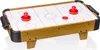 A miniature air hockey table with two red paddles and a white playing surface with red markings. Anteprima dell’immagine prodotto