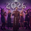 A group of people in costumes celebrating at a party with balloons spelling '2026'. Náhled obrázku produktu
