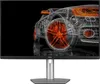 A wireframe rendering of a sports car is displayed on a monitor, with a focus on the wheels and headlights. The monitor itself is also visible. Podgląd zdjęcia produktu