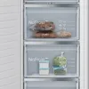 Close-up of open freezer drawers containing food. Produktbild-Vorschau