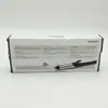 A product box with a curling iron resting on it. Anteprima dell’immagine prodotto