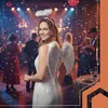 A woman dressed as an angel at a party with confetti falling. Anteprima dell’immagine prodotto