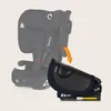 A car seat and a detachable base are shown. An orange arrow indicates the base is being attached to the car seat. Produktbild-Vorschau