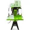 A side view of a green log splitter on a black stand, against a white background. Náhled obrázku produktu