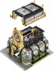 A top-down view of a LEGO-style botanical garden building set, with a separate roof piece shown above the main structure. Anteprima dell’immagine prodotto