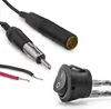 A collection of electronic car accessories including an antenna adapter, a female connector, and a toggle switch with wires. Produktbild-Vorschau