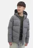 A young boy wearing a puffer jacket and a sweater. Produktbild-Vorschau