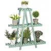 A light green, three-tiered plant stand filled with various potted plants. Produktbild-Vorschau