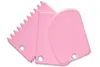 Three pink cake decorating spatulas are arranged on a white background. Podgląd zdjęcia produktu
