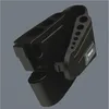 A black tool holder with multiple circular openings for tools. Anteprima dell’immagine prodotto