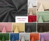 A collage of fabric swatches and tablecloths in various colors, showcasing different options. Produktbild-Vorschau