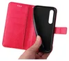 A hand is holding a red flip phone case open, revealing the black interior where a phone would be placed. Produktbild-Vorschau