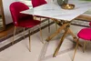 A dining table with chairs in a room setting. Anteprima dell’immagine prodotto