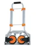 A foldable trolley with a telescopic handle and orange wheels, shown against a white background. Náhled obrázku produktu
