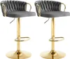 Two dark gray bar stools with gold legs and footrests are shown against a white background. Produktbild-Vorschau