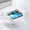 A cutaway view of a white USB charger plugged into a white wall socket, revealing the internal circuit board with glowing blue lights. Podgląd zdjęcia produktu