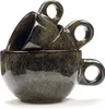 Three stacked ceramic mugs with a speckled green and brown glaze. Voir les images du produit