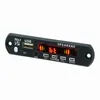 A close-up studio shot of a black Bluetooth decoder board with a digital display and various ports and buttons. Produktbild-Vorschau