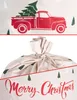 A collage showing a Christmas sack with a red truck and Christmas tree design, and a close-up of the sack's drawstring closure and text. Podgląd zdjęcia produktu