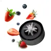 A blender blade assembly with strawberries and blueberries flying around it. Podgląd zdjęcia produktu