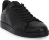 A black leather sneaker on a white background. Voir les images du produit