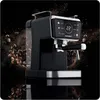 A black espresso machine with a digital display, surrounded by flying coffee beans and powder against a black background. Produktbild-Vorschau