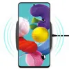 A smartphone is placed on a wireless charger, indicated by glowing blue waves emanating from the charger. Produktbild-Vorschau