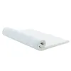 A white mattress topper is rolled up on the left side. Náhled obrázku produktu