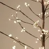 Close-up of a decorative tree with many small LED lights attached to its branches. Náhled obrázku produktu