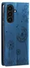 A blue flip phone case with a dandelion design. Produktbild-Vorschau