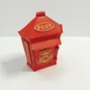 A red retro post box on a white background. Produktbild-Vorschau