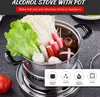 A stainless steel alcohol stove with a pot filled with hot pot ingredients. Podgląd zdjęcia produktu