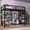 A loft bed with a desk, chair, and shelves in a room. Produktbild-Vorschau