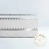 A cross-section of a mattress showing its layered structure, with a quality seal in the foreground. Produktbild-Vorschau