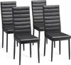 Four black dining chairs are arranged in a studio setting against a white background. Náhled obrázku produktu