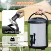 An outdoor setting with a tent and table, featuring a beverage dispenser and a close-up of its handle. Anteprima dell’immagine prodotto