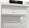Close-up interior view of a white refrigerator. Produktbild-Vorschau