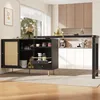 A modern kitchen or dining area with a black sideboard and bar table. Podgląd zdjęcia produktu