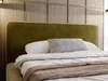 A close-up view of a bed with a green upholstered headboard and white bedding. Produktbild-Vorschau