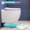 A wall-mounted toilet is shown with a robotic vacuum cleaner cleaning the floor underneath it. The scene is set in a modern bathroom with blue tiled walls. Náhled obrázku produktu