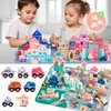 Two children are playing with wooden building blocks and toy vehicles, creating a miniature city scene on a puzzle mat. Náhled obrázku produktu