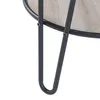 Close-up of a hairpin leg and the shelf of a side table. Anteprima dell’immagine prodotto