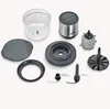 A collection of disassembled parts of a food processor, laid out on a white background. Produktbild-Vorschau