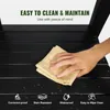 A hand is wiping a black wooden surface with a cloth, with water droplets on the surface. Text overlays highlight features like 'Easy to Clean & Maintain' and icons represent 'Corrosion-proof', 'Stain Resistant', 'Waterproof', and 'Easy to Wipe Clean'. Podgląd zdjęcia produktu